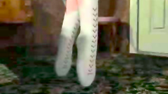 Two hot busty women dressed in latex love anal fisting