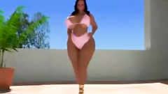 Hot big bosomed girl preparing to strip performance