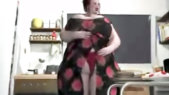 Redhead BBW woman in glasses swallows huge dick