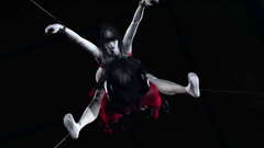 Nakime in her servitude outfit is attacked by a supreme demon until she is left without energy