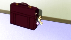 Young long-haired maid shows her huge and massive breasts