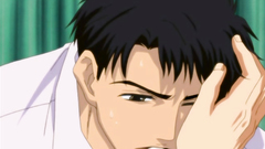 Two handsome gays kisses each other in the bedroom