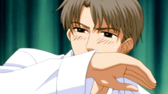 Two handsome gays kisses each other in the bedroom